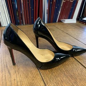 Christian Louboutin black patent leather pumps